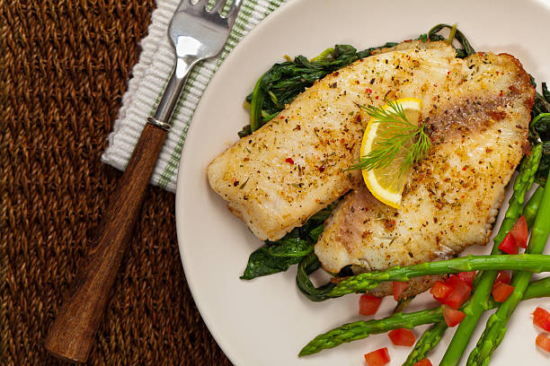 Weight Loss Chandler AZ Whitefish with Roasted Asparagus. Selective focus.